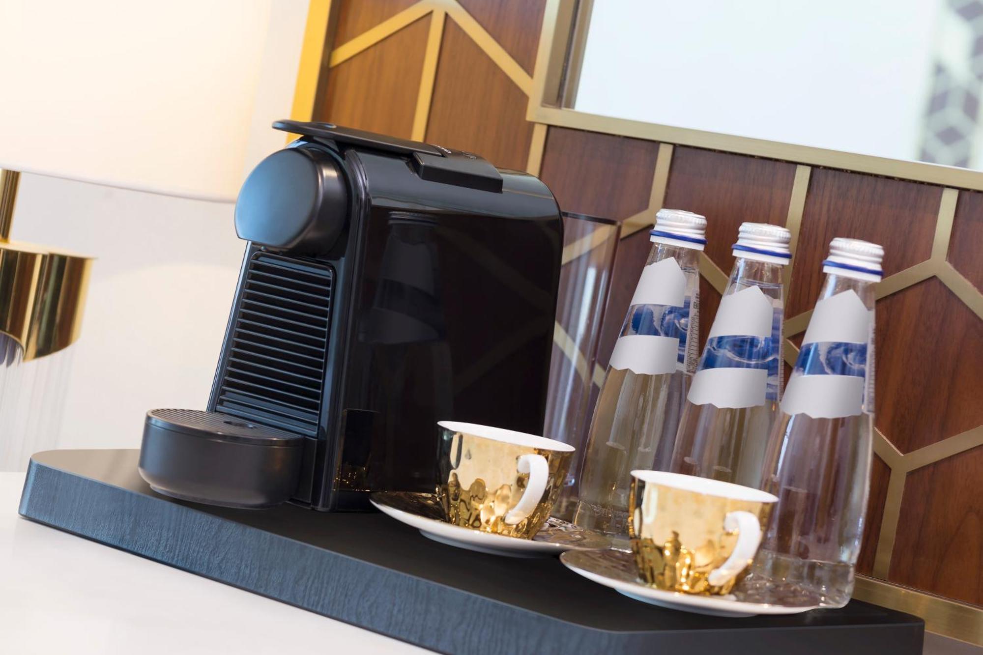 Velero Hotel Doha Lusail Ngoại thất bức ảnh A Nespresso coffee machine